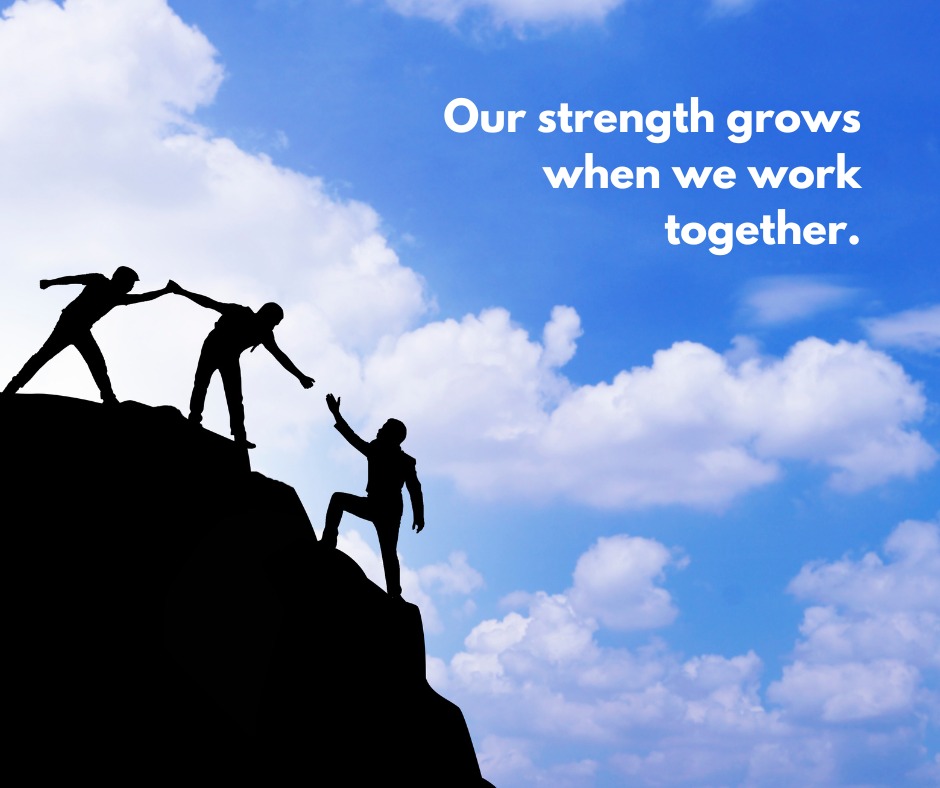 Modern office space with digital screens showing analytics dashboards and collaborative team working